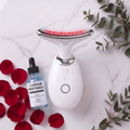 LumiSculpt Glow System bundle — Pearl White LED sculptor with LumiGlow copper peptide serum on marble with rose petals
